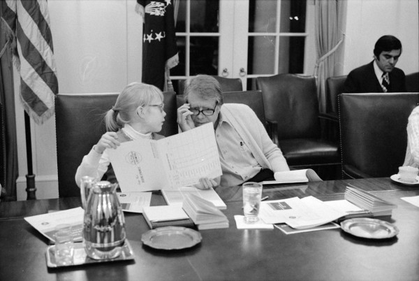 Amy Carter and Jimmy Carter taking a speed reading course at the White House