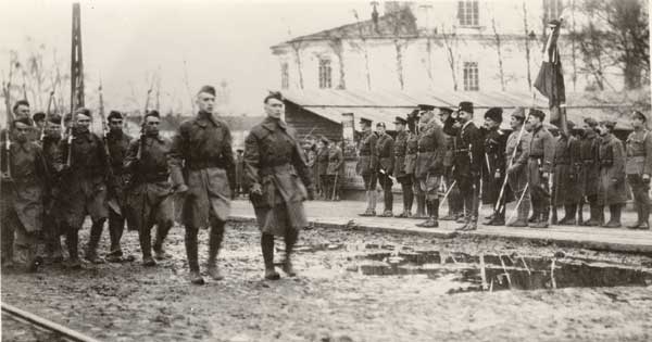 American troops in North Russia march past their Bolshevik foes in one of the many photographs taken by the U.S. Army Signal Corps,1918-19. (Bentley Historical Library, University of Michigan)