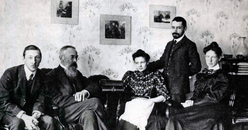 Igor Stravinsky, at right, with Nikolai Rimsky-Korsakov in in the latter’s living room in 1908 (Wikimedia Commons)