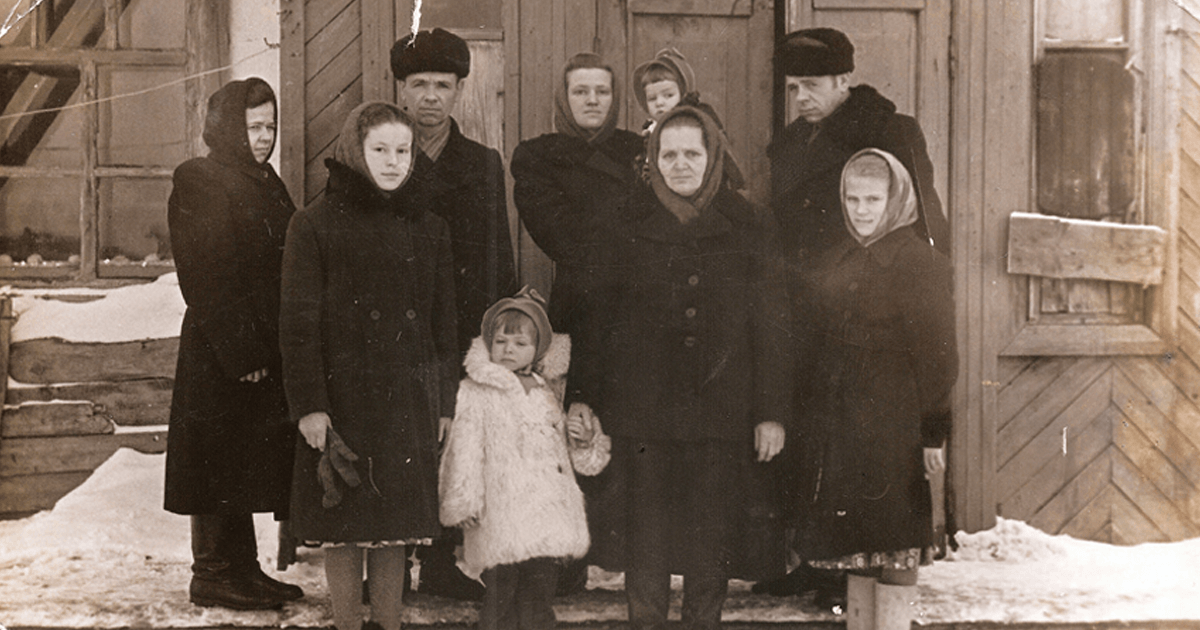 Members of the author’s family, including her grandmother ( holding baby) at their Siberian special settlement, c. 1956 (Courtesy of the author)