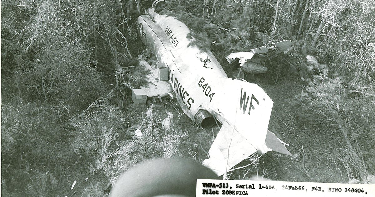 Wreckage of Zobenica's F-4B Phantom II fighter-bomber after it sliced through 750 feet of forest and finally came to rest in a creek bed. (Courtesy of the author)