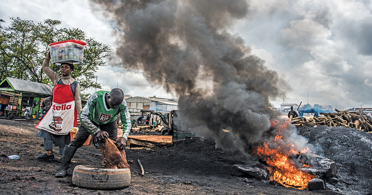 As liquefied petroleum gases have grown more expensive, Ghanaian companies have begun using tire fires to process meat for human consumption. (Rob G. Green and Michael O'Hara)
