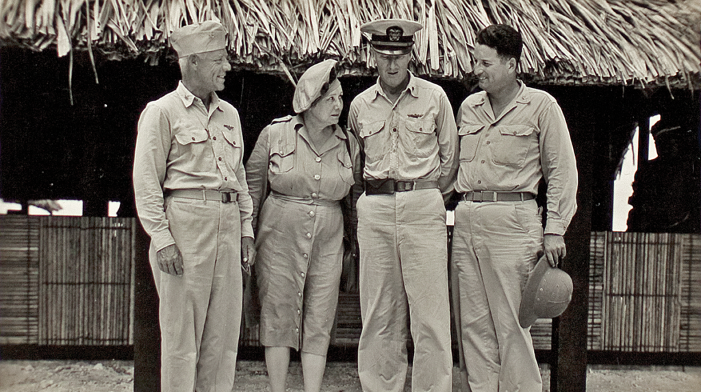 "As long as we have American boys [at war], I want to write their story for them," said Hull, pictured here with three Army officers during World War II. (From the Kenneth Spencer Research Library, University of Kansas)