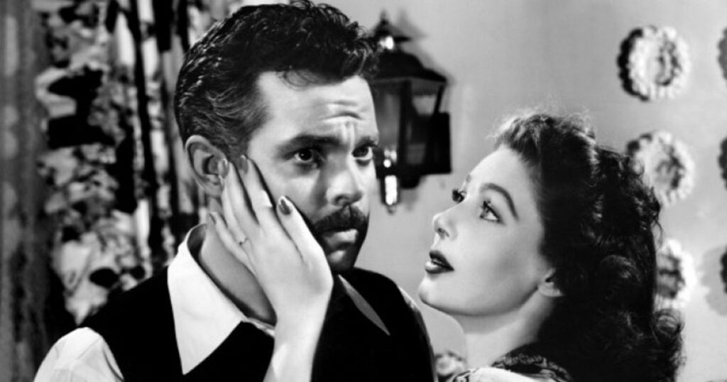 Orson Welles and Loretta Young in 1946's  <em>The Stranger</em> (Wikimedia Commons) 