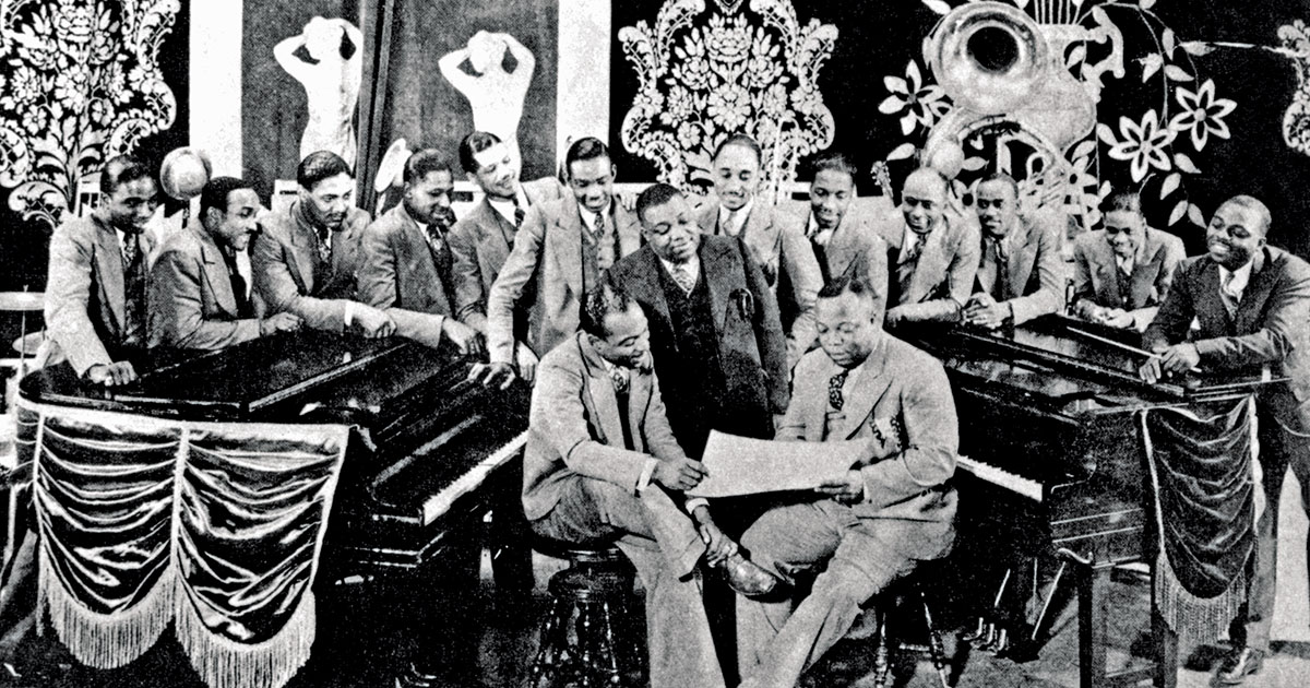 Moten’s band, shown here in 1932, played music propelled by what Albert Murray called “the velocity of celebration.” (Pictorial Press/Alamy)