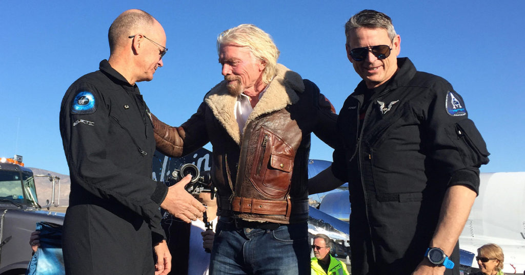 Stucky (right) with SpaceShipTwo copilot Frederick Sturckow and Virgin Galactic founder Richard Branson (PA Images/Alamy)