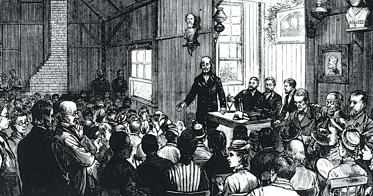 Ralph Waldo Emerson delivers a speech to a rapt audience at the Concord School of Philosophy.