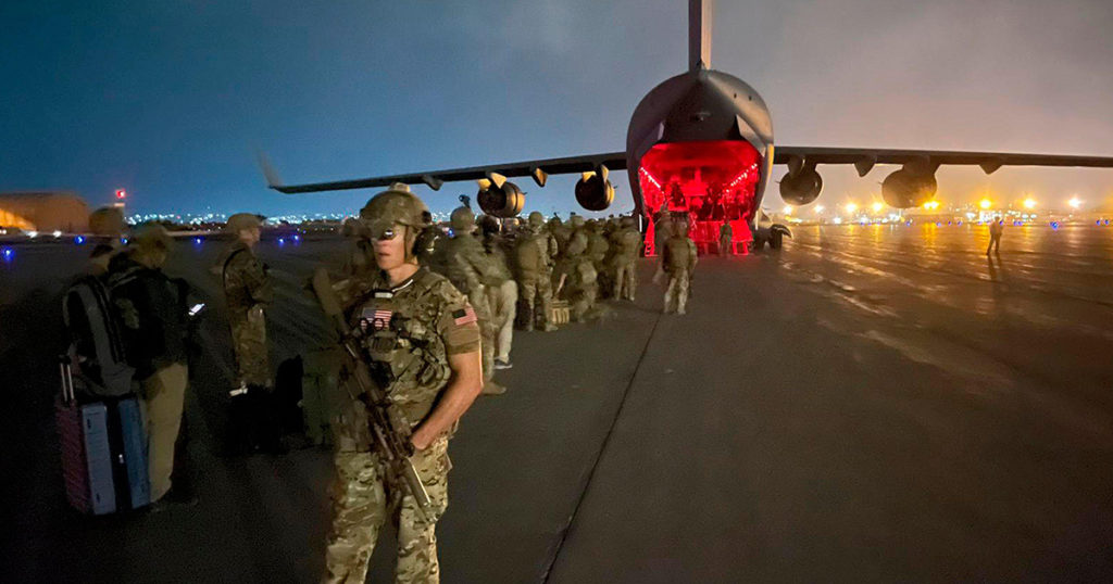 Paratroopers from the 82nd Airborne boarding a C-17 at the Kabul airport on August 30, 2021, marking the end of the U.S. presence in Afghanistan (American Photo Archive/Alamy)
