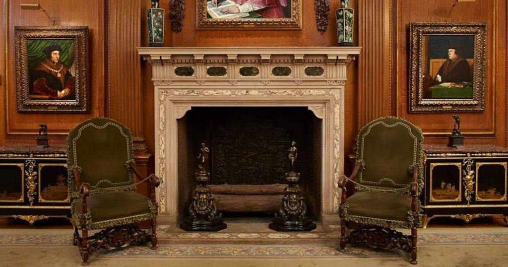 <em>Sir Thomas More</em> and <em>Thomas Cromwell</em> facing off across the hearth of the Living Hall (Frick Collection)