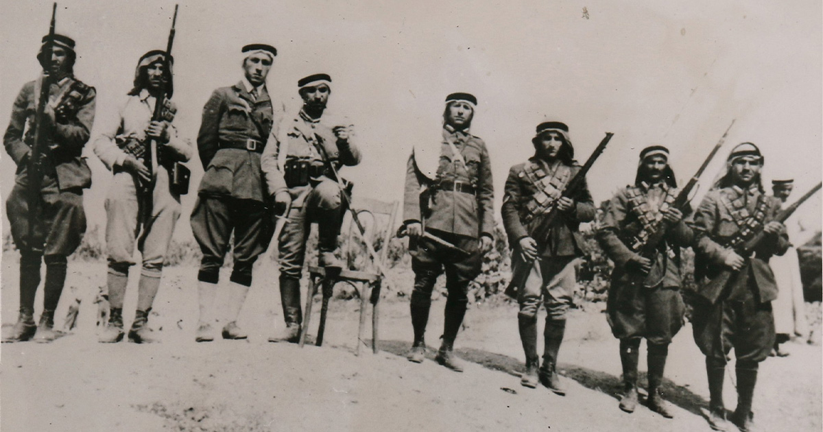 Press photograph of Arab rioters with their commander, Abd-el-Razak, in September 1938 (Wikimedia Commons)