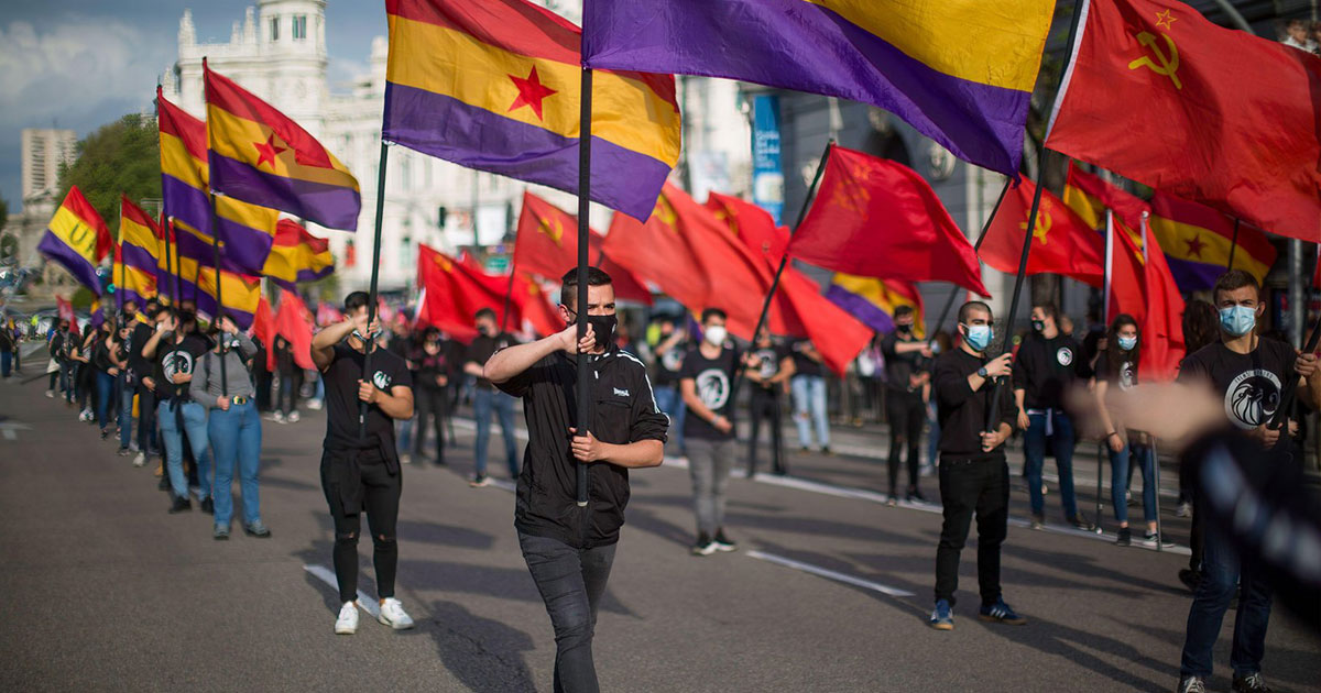 Young people holding Republican flags parade during the 90th anniversary march of the Second Spanish Republic (Luis Soto/SOPA Images/Sipa USA)