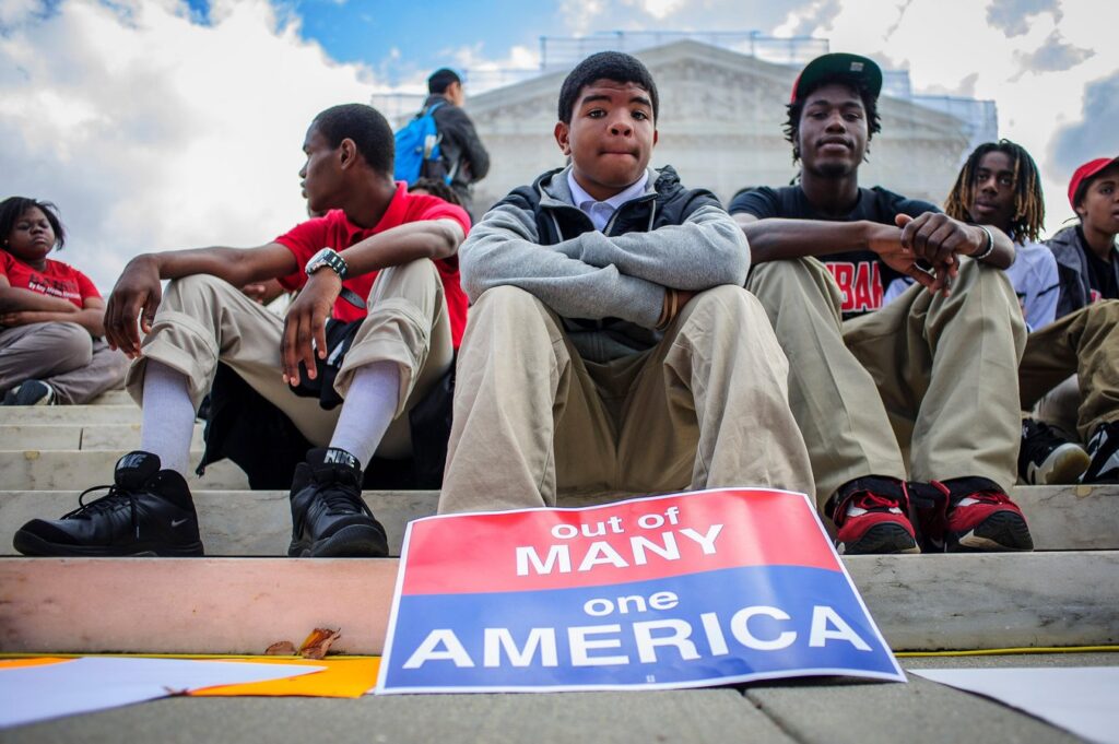 Supporters of affirmative action outside the Supreme Court on October 10, 2012, the day the Supreme Court heard <em>Fisher v. University of Texas</em> (Pete Marovich/ZUMA Press, Inc/Alamy)