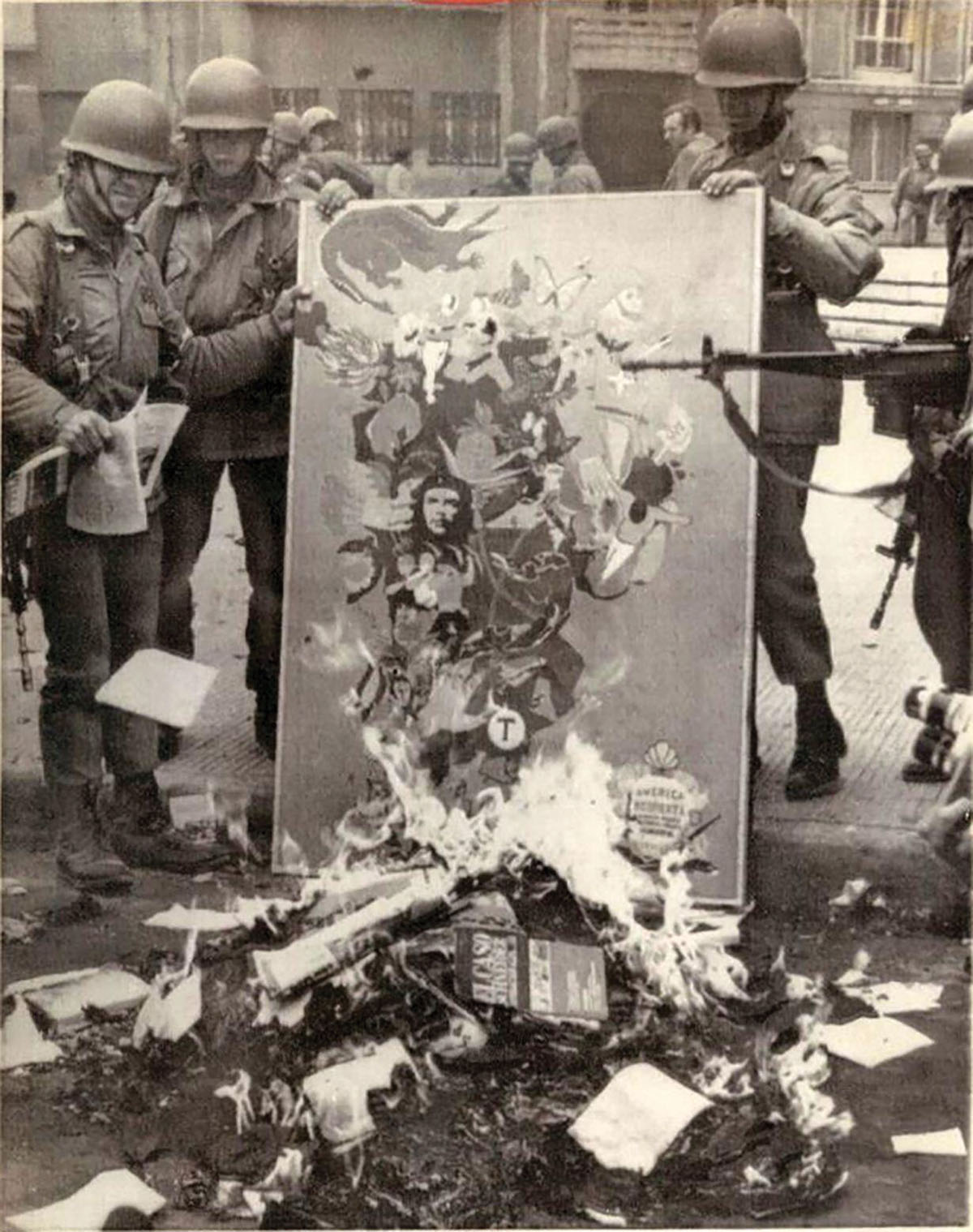 Soldiers burning Marxist literature in Chile, 1973 (Hum Images/Alamy)