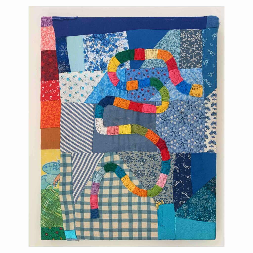 <em>Candy Land</em>, 2022, embroidery on pieced found fabrics, 11 x 14 inches.