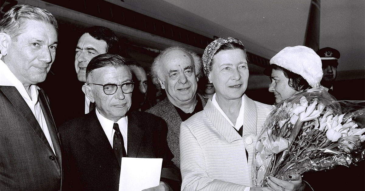 Jean Paul Sartre (second from left) and Simone de Beauvoir (right) arrive in Israel and are welcomed by Avraham Shlonsky (center) at Lod airport near Tel Aviv, March 1967 (Wikimedia Commons)