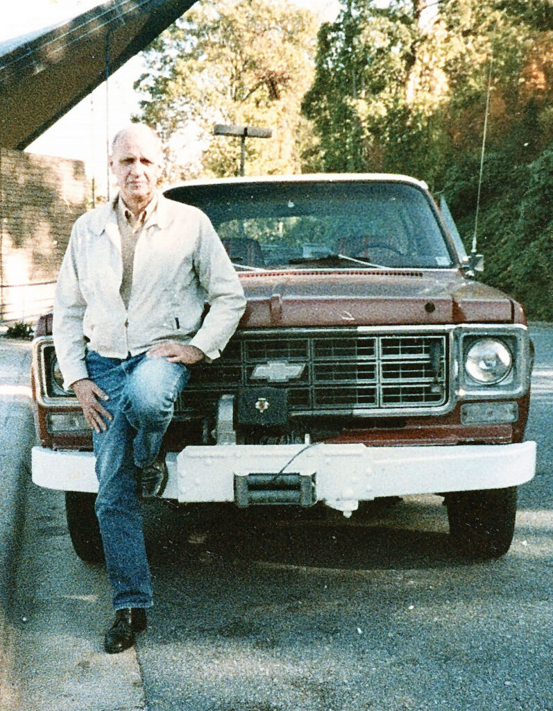 Charles Portis, “our least-known great novelist,” with his pickup truck (Copyright the Charles Portis Estate)
