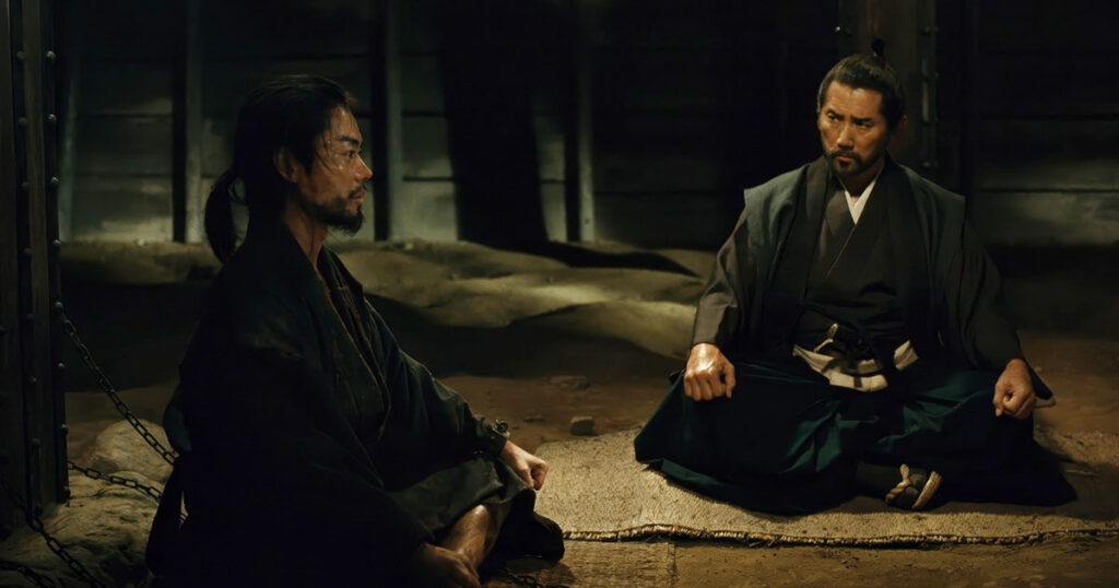 From left, Kuroda Kanbei (Masaki Suda) and Araki Murashige (Masahiro Motoki) in Kiyoshi Kurosawa’s <em>The Samurai and the Prisoner</em> (Janus Films/Everett Collection)